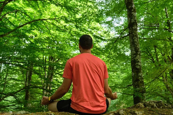 Young Man Doing Yoga Outdoors Stone Middle Forest Lotus Pose — Stock Photo, Image