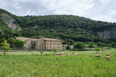 Monastery of Santa Mara la Real de Iranzu, abbey corridors with sculpted stone arches, Navarra, Spain. 