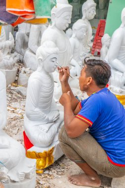 Stonemason working in Mandalay Myanmar Burma Southeast Asia