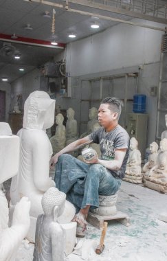 Stonemason working in Mandalay Myanmar Burma Southeast Asia