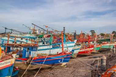 Thai fishing boats at a pier or wharf in Thailand Southeast Asia