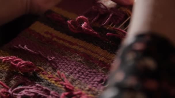 Handmade tapestry in slow motion — Stockvideo