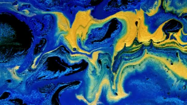 Abstract ink painting blue and gold background. Mixture of acrylic paints, marble abstract fluid art pattern. — Stock Video