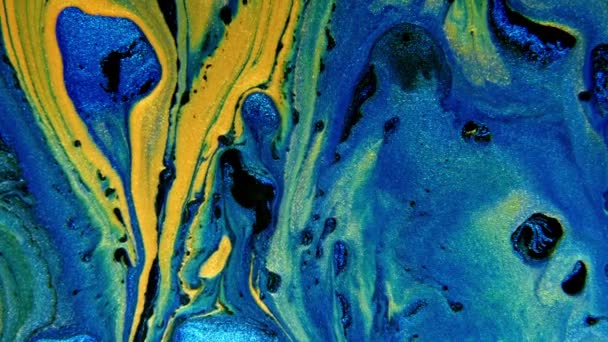 Abstract ink painting blue and gold background. Mixture of acrylic paints, marble abstract fluid art pattern. — стоковое видео