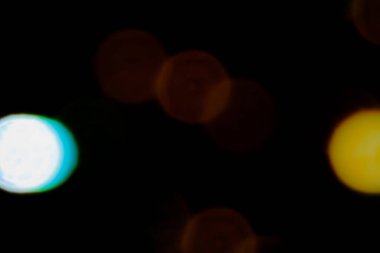 Renkli bulanık ışıkların soyut çizimi arka plan, bokeh etkisi, siyah arkaplan üzerinde