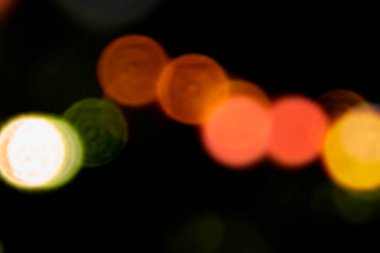 Renkli bulanık ışıkların soyut çizimi arka plan, bokeh etkisi, siyah arkaplan üzerinde