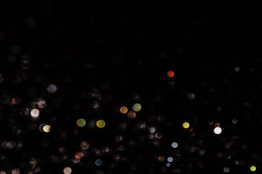Renkli bulanık ışıkların soyut çizimi arka plan, bokeh etkisi, siyah arkaplan üzerinde