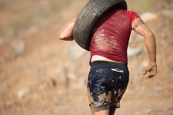Runner Carrying Tire Test Race — Stock Photo, Image