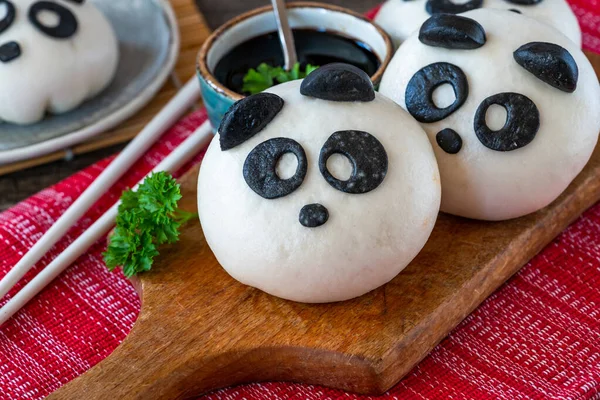 Steamed panda buns with savoury mushroom and hoisin filling. Chinese New Year celebrations