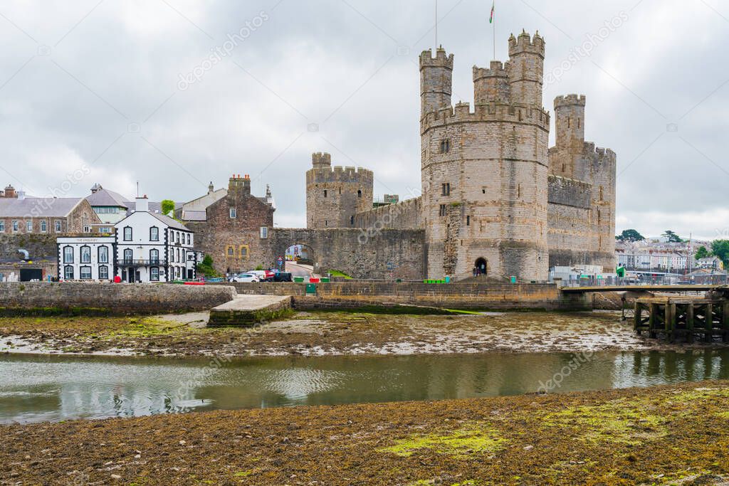 CAERNARFON, WALES JULY 08, 2022 View of Caernarfon Castle ruins, a