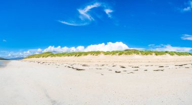 Wide panoramic view of Luskentyre Sands beach on the Isle of Harris, Scotland, UK