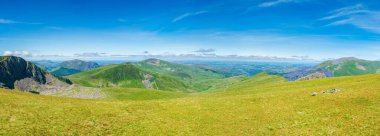 A scenic panoramic view from Mount Snowdon on a bright sunny day, Wales