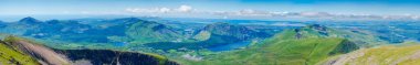 A scenic panoramic view from Mount Snowdon on a bright sunny day, Wales