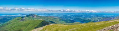 A scenic panoramic view from Mount Snowdon on a bright sunny day, Wales