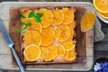Orange and almond upside-down cake with orange syrup