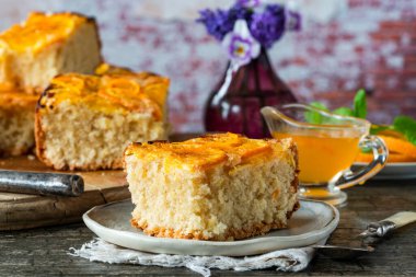 Orange and almond upside-down cake with orange syrup