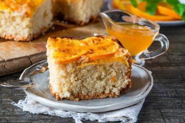 Orange and almond upside-down cake with orange syrup