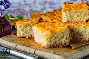 Orange and almond upside-down cake with orange syrup