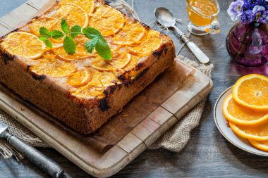 Orange and almond upside-down cake with orange syrup