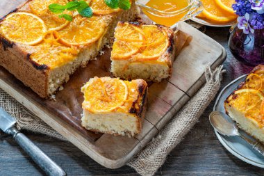 Orange and almond upside-down cake with orange syrup