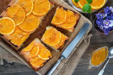Orange and almond upside-down cake with orange syrup