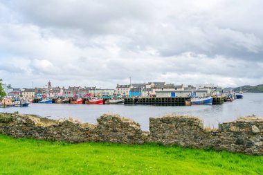 STORNOWAY, ISLE OF LEWIS, SCOTLAND, AUGUST 02, 2022: View of harbour in Stornoway, the main town of the Western Isles and the capital of Lewis and Harris in Scotland.