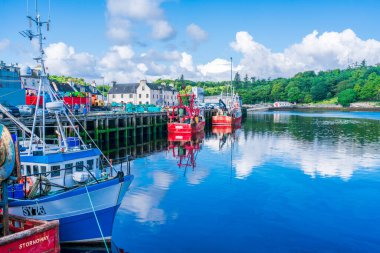 STORNOWAY, ISLE OF LEWIS, SCOTLAND, AUGUST 05, 2022: View of the harbour in Stornoway, the main town of the Western Isles and the capital of Lewis and Harris in Scotland.