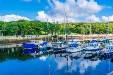 STORNOWAY, ISLE OF LEWIS, SCOTLAND, AUGUST 05, 2022: View of the harbour in Stornoway, the main town of the Western Isles and the capital of Lewis and Harris in Scotland.