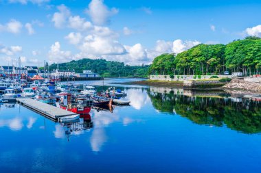 STORNOWAY, ISLE OF LEWIS, SCOTLAND, AUGUST 05, 2022: View of the harbour in Stornoway, the main town of the Western Isles and the capital of Lewis and Harris in Scotland.