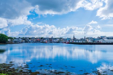 STORNOWAY, ISLE OF LEWIS, SCOTLAND, AUGUST 05, 2022: View of the harbour in Stornoway, the main town of the Western Isles and the capital of Lewis and Harris in Scotland.