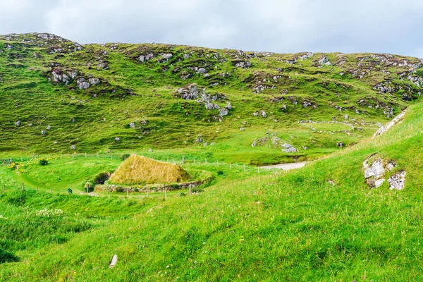 Bosta (Bostadh) Iron Age House covered with grass - Isle Of Lewis, Scotland