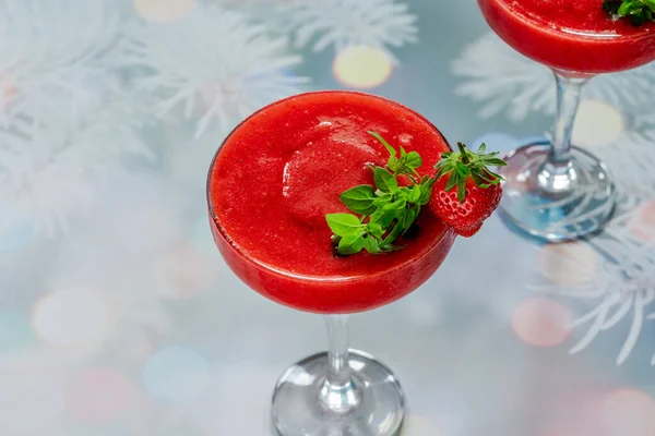 Frozen strawberry daiquiri with white rum garnished with fresh fruit