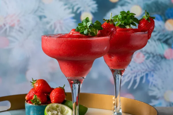 Frozen strawberry daiquiri with white rum garnished with fresh fruit