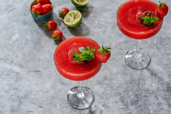 Frozen strawberry daiquiri with white rum garnished with fresh fruit