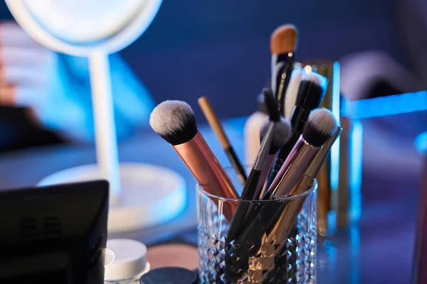 Mirror for makeup standing at the table. Dressing table and mirror in dressing room — Stock Photo, Image