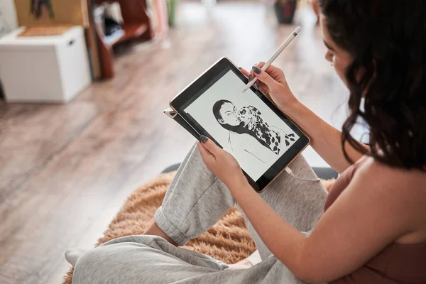 Female illustrator holding tablet and preparing new black and white picture while working — Stock Photo, Image