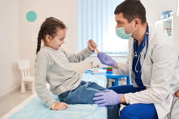 Side View Male Doctor Giving Candy Little Girl Medical Check — Stock Photo, Image