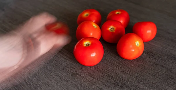 Man Hand Quickly Picking Organic Red Tomato His Kitchen Table — Photo