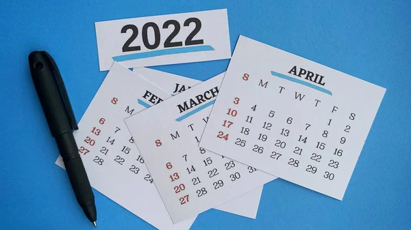 Close up of April month with background of assorted calender of various months. 2022 New Year concept — Zdjęcie stockowe