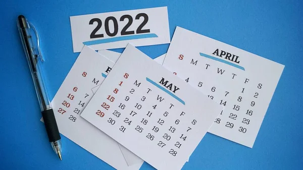 Close up of May month with background of assorted calender of various months. 2022 New Year concept