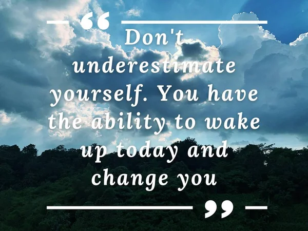Motivational and inspiration quotes - Dont underestimate yourself. You have the ability to wake up today and change you. With blue sky, trees and cloud background.