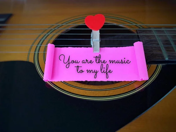 You are the music to my life on a torn with guitar background. Valentines day concept — Foto Stock