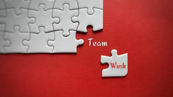 Top view of text with the word Team Work on jigsaw puzzle. — Stock Photo, Image