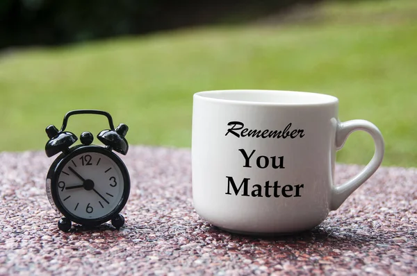 Motivational and Inspirational quote - You matter. With coffee cup and alarm clock background. — Stock Photo, Image