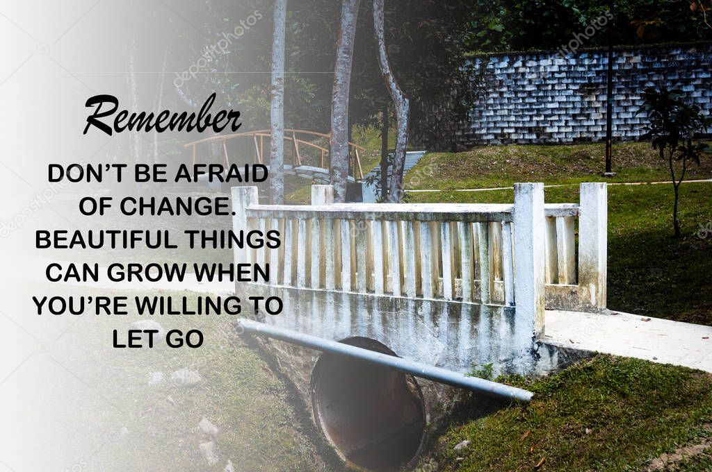 Motivational and Inspirational quote - Dont be afraid of change. Beautiful things can grow when youre willing to let go. With blurred bridge background.