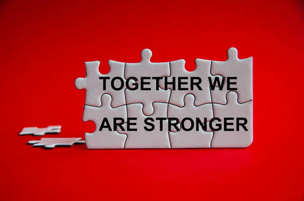 Together Stronger Text Jigsaw Puzzle Red Background Trust Teamwork Concept — Stock Photo, Image