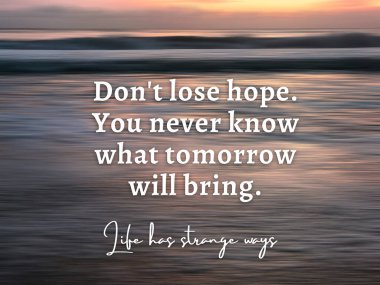 Inspirational quote - Dont lose hope. You never know what tomorrow will bring. With blurry beach background in digital motion effect and bright smooth backdrop.