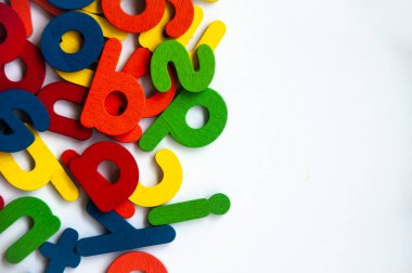 Wooden color letters on white background. Copy space.