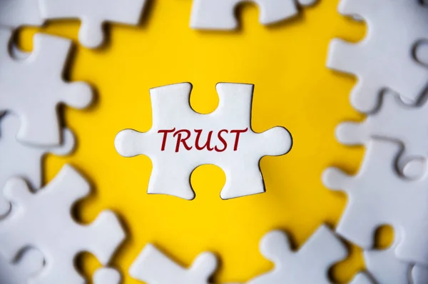 Trust Text Jigsaw Puzzle Yellow Background Trust Concept Business World —  Fotos de Stock