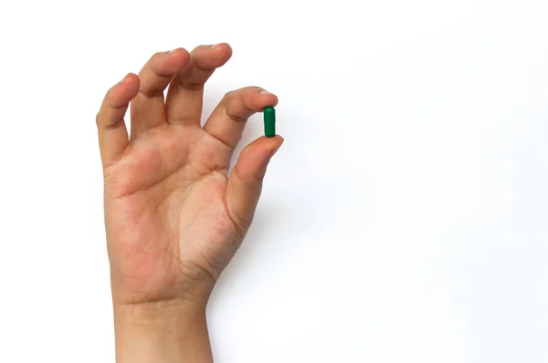 Donna Mano Raccogliendo Una Pillola Isolata Sfondo Bianco Copia Spazio — Foto Stock